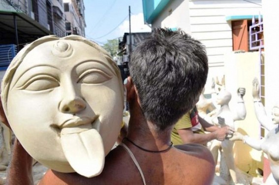 Artisans giving final touches to Goddess Kali idols ahead of Deepavali festival in Agartala. TIWN Pic Oct 18 Artisans giving final touches to Goddess Kali idols ahead of Deepavali festival in Agartala. TIWN Pic Oct 18